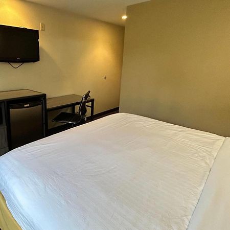 Travelodge By Wyndham Arlington/Dallas Area Extérieur photo